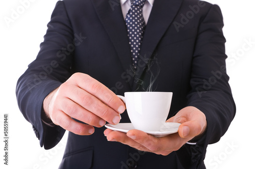 Business man offering cup of coffee.