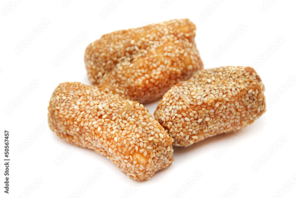 Chinese snack , Pastries with Sesame Seeds on white background Chinese snack , Pastries with Sesame Seeds on white background
