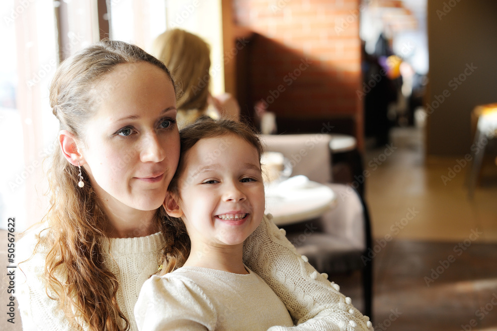 Mother and daughter together in restaurant Mother and daughter together in restaurant