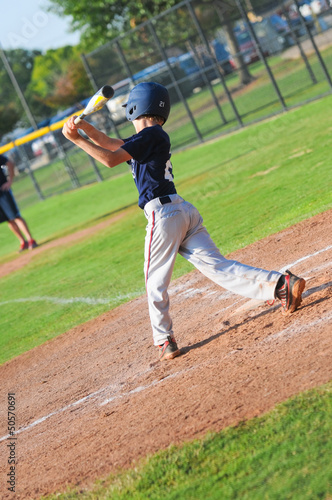 Photography Pre-teen baseball player at bat