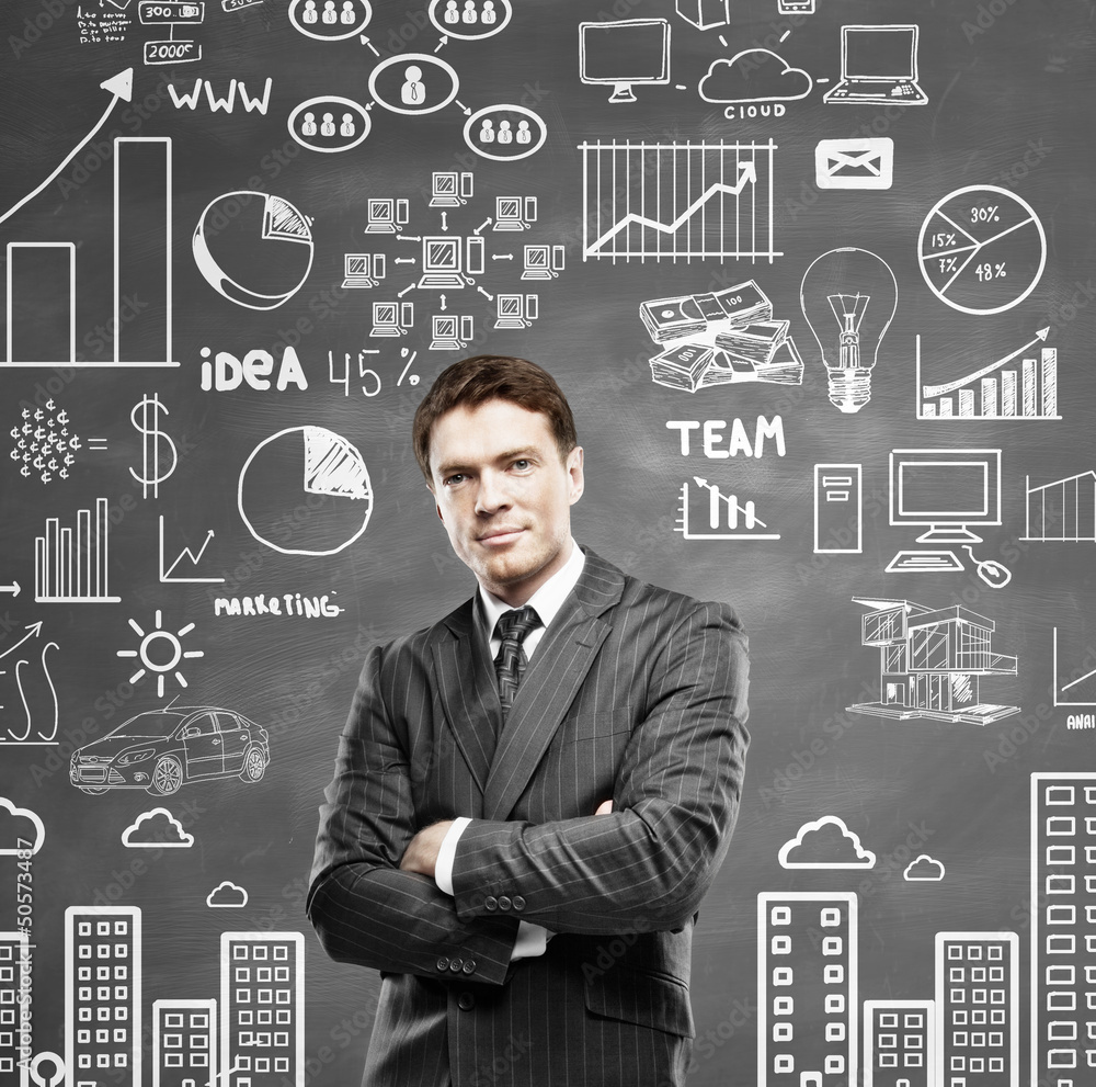 man standing and drawing business concept on wall