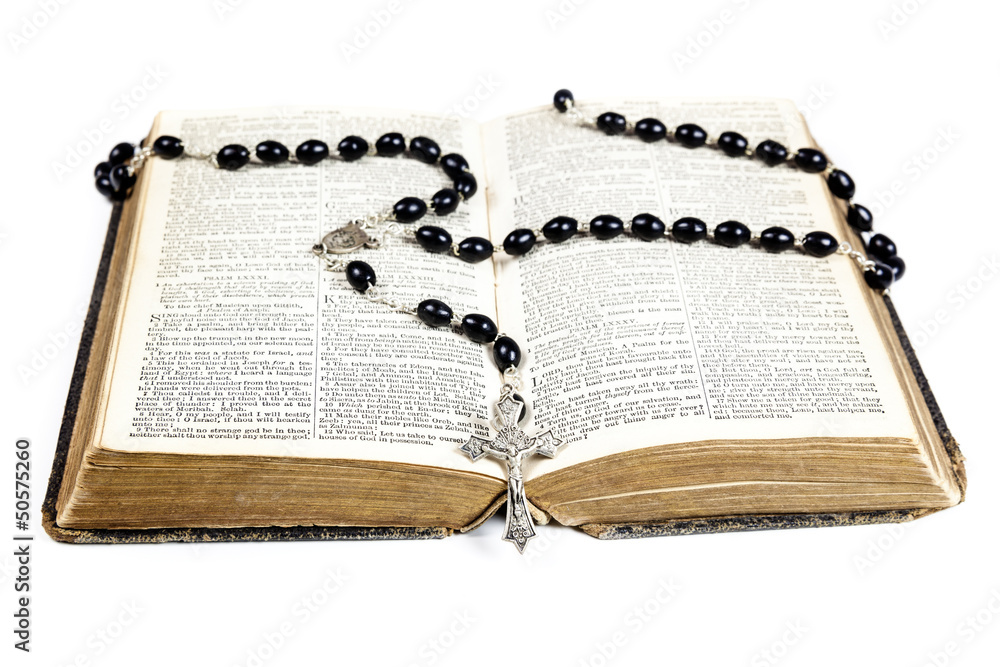 Rosary beads, cross and Bible