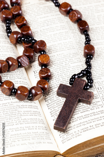 Rosary beads, cross and Bible