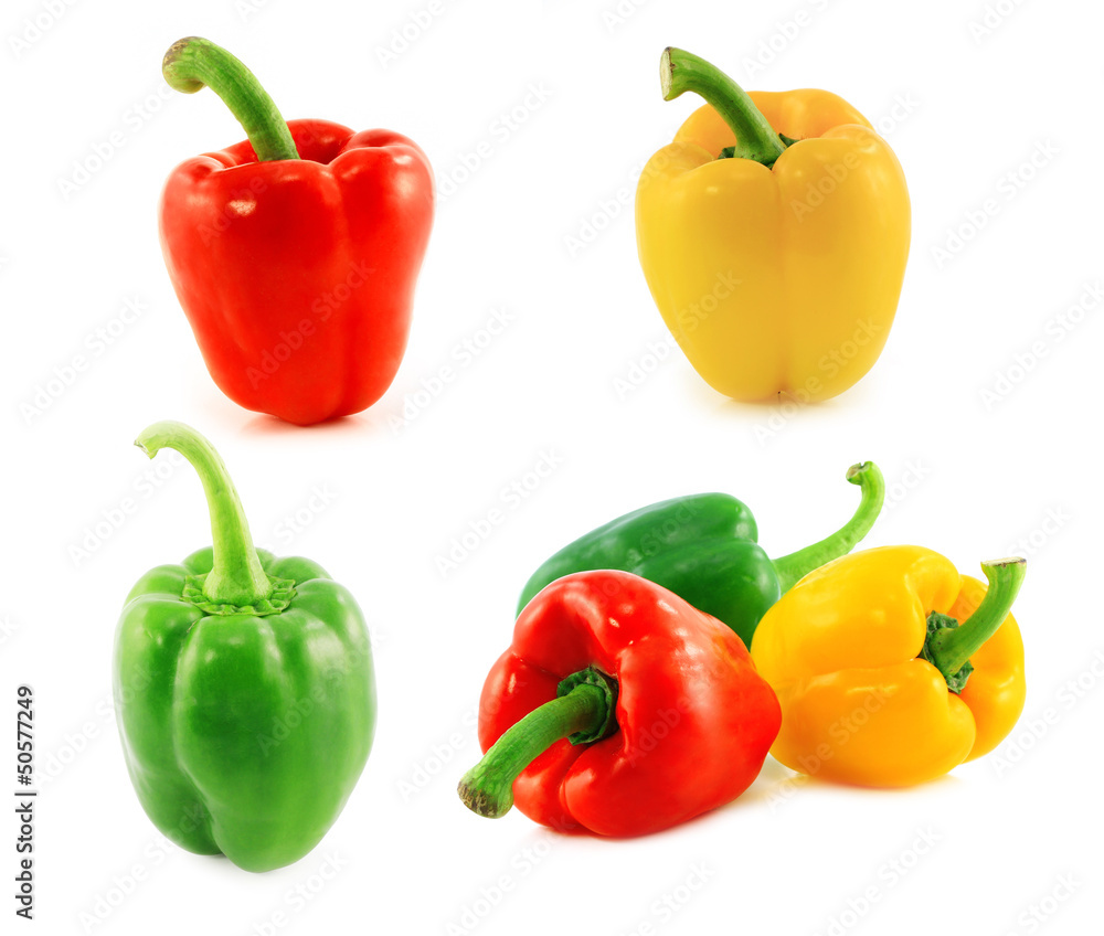 Red,green and yellow bell peppers on white background