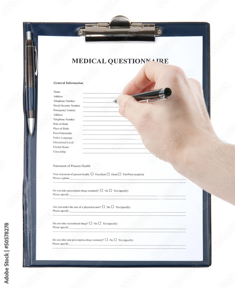 Hand with a pen filling in medical questionnaire form Hand with a pen filling in medical questionnaire form