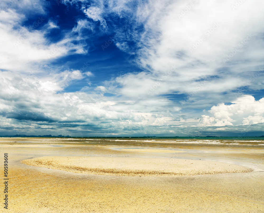 Beautiful sky and beach at low tide