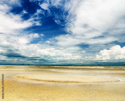 Beautiful sky and beach at low tide