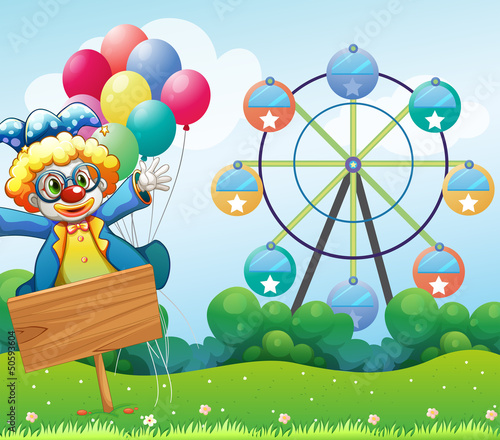A clown with balloons and the empty signage