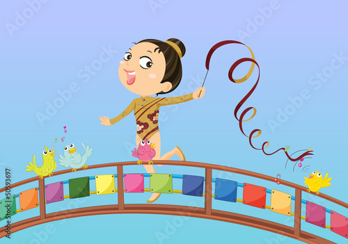 A girl holding a stick with ribbon