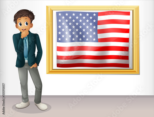 A framed flag of the USA beside a man