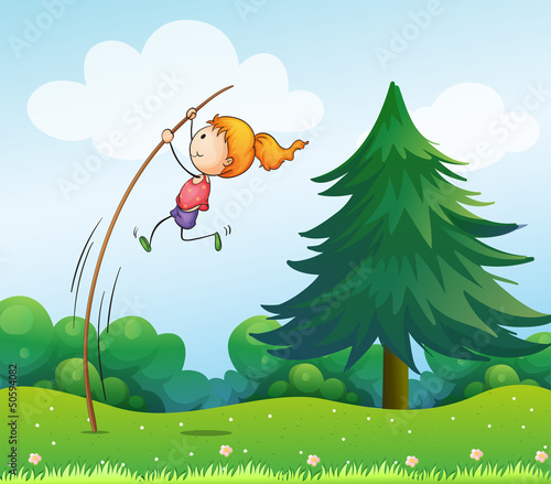 A girl playing with the stick at the hills
