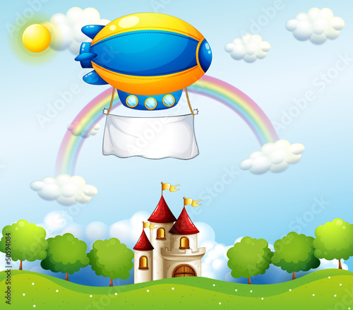 An airship with an empty banner above a castle