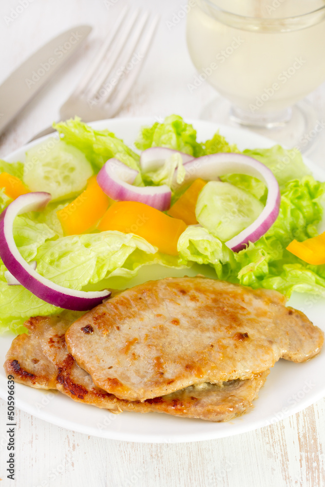 fried meat with fresh salad fried meat with fresh salad