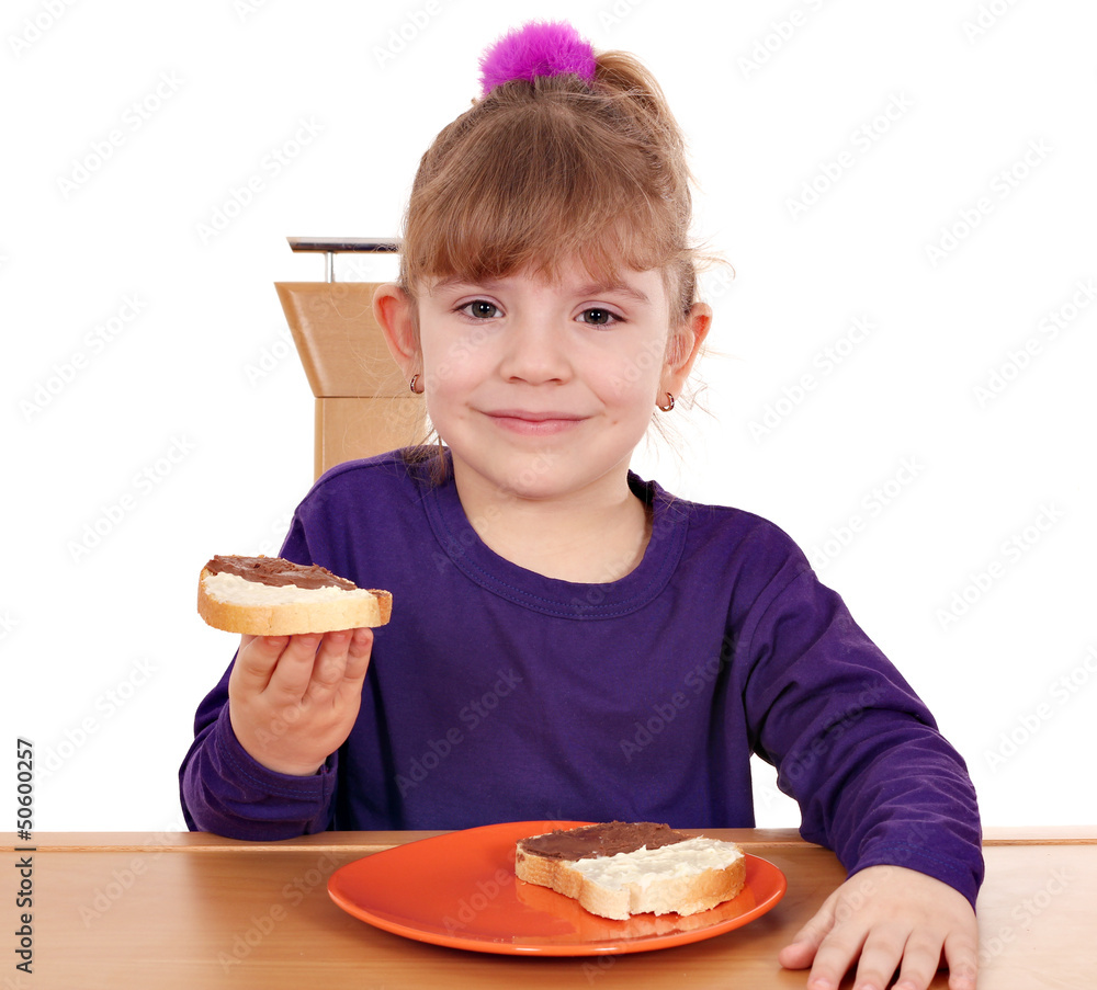 little girl eat bread with chocolate cream little girl eat bread with chocolate cream