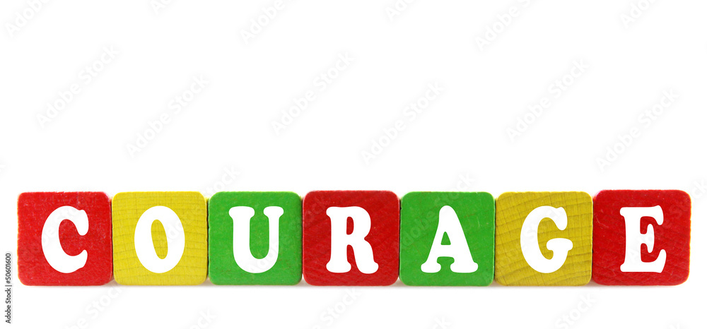 courage - isolated text in wooden building blocks courage - isolated text in wooden building blocks
