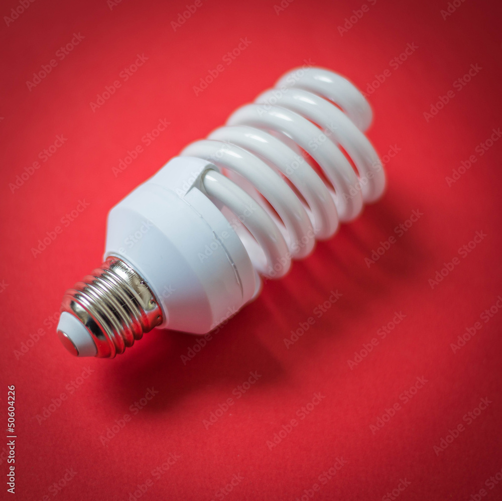 light bulb on a red background light bulb on a red background