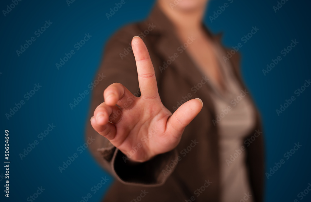 Woman pressing imaginary button Woman pressing imaginary button