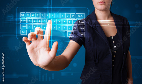 Girl pressing virtual type of keyboard