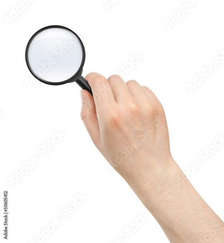 magnifying glass in the hand on white background