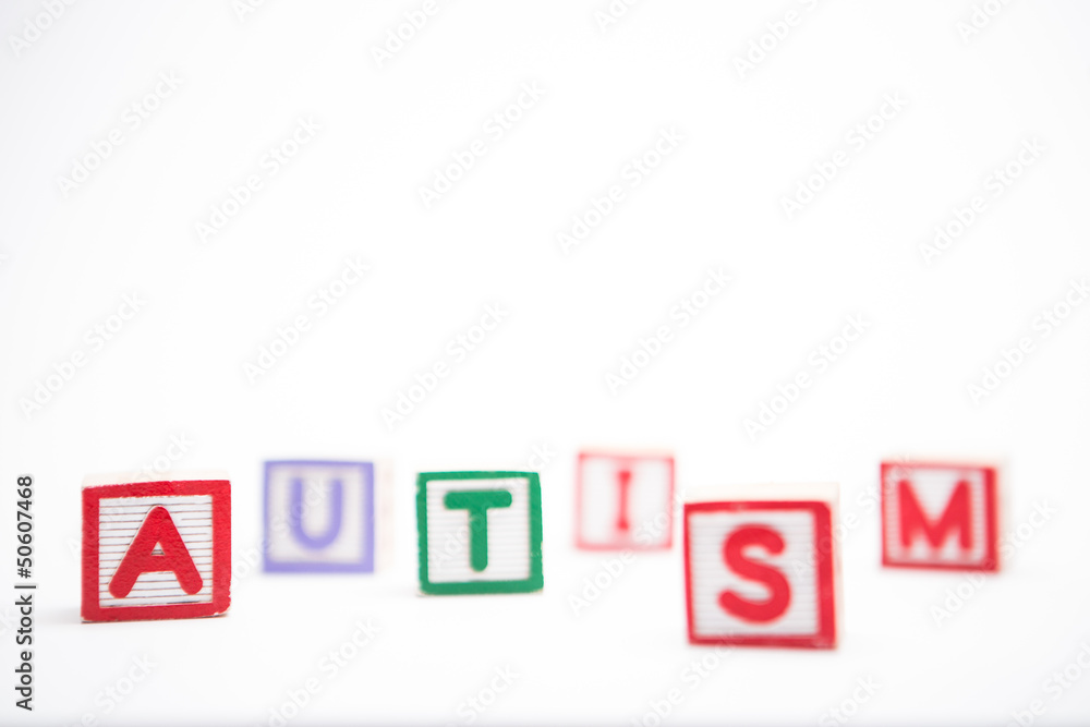 Obraz premium Autism spelled out in letter blocks