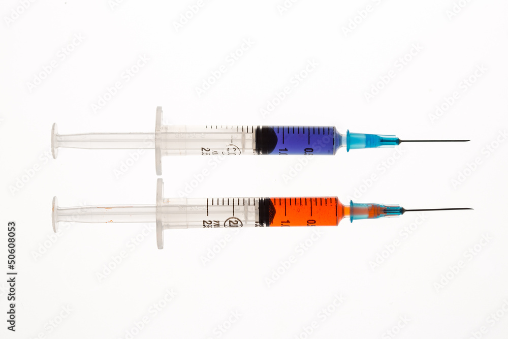 Fototapeta premium Two syringes beside each other