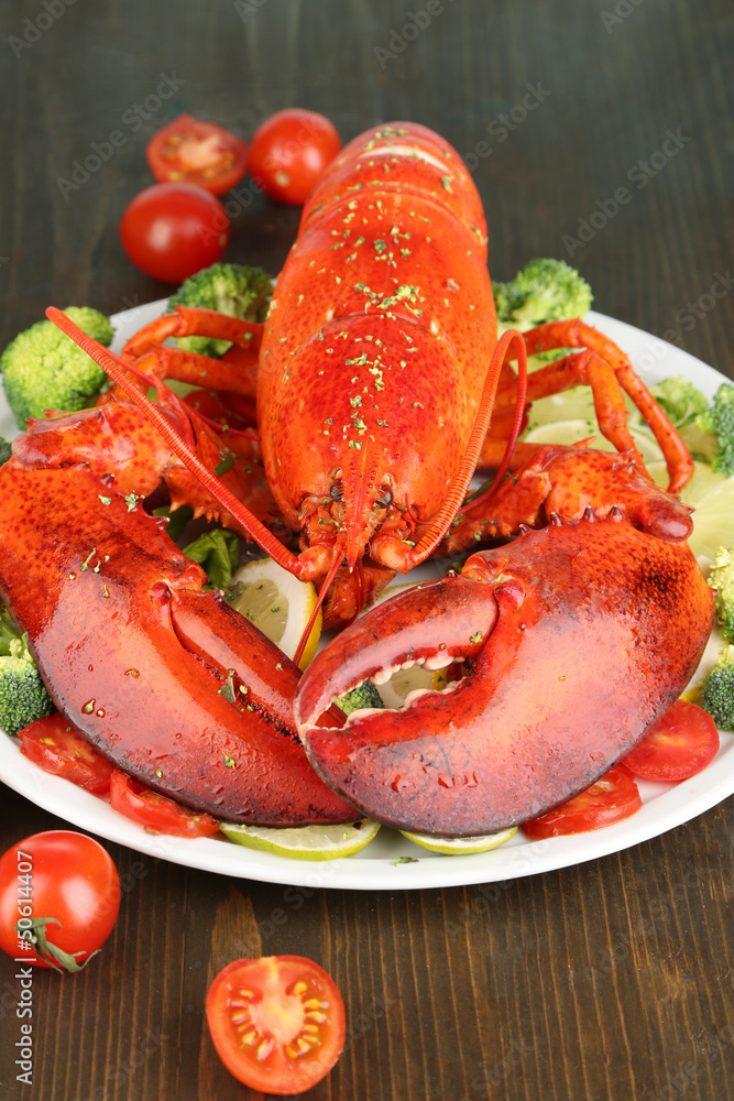 Red lobster on platter on table close-up Red lobster on platter on table close-up