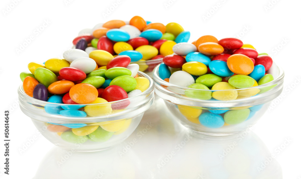 Colorful candies in glass bowls isolated on white Colorful candies in glass bowls isolated on white