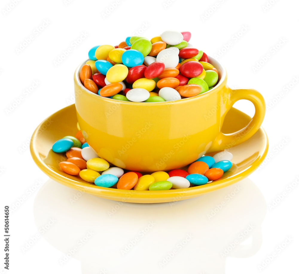 Colorful candies in cup isolated on white Colorful candies in cup isolated on white