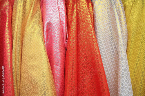 Closeup pattern of colorful glitter silk fabric © Blanscape