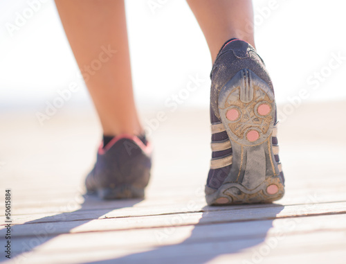 Close-up Of Female Legs Jogging