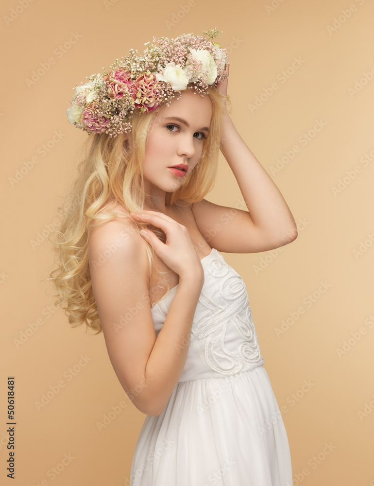 woman wearing wreath of flowers woman wearing wreath of flowers