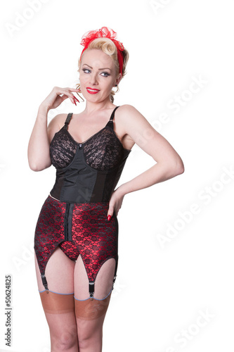 Retro blond in vintage lingerie glancing - isolated on white