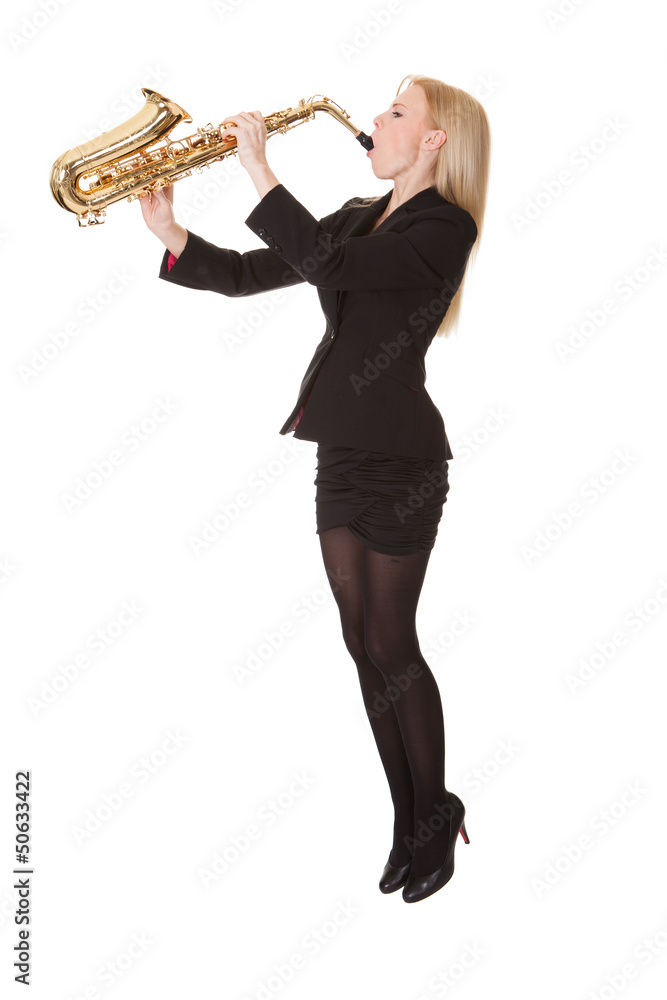 Naklejka premium Beautiful young woman playing saxophone