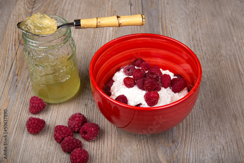 healthy breakfast with yogurt, raspberry and jam