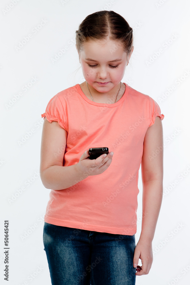 Small and beautiful girl with a phone Small and beautiful girl with a phone