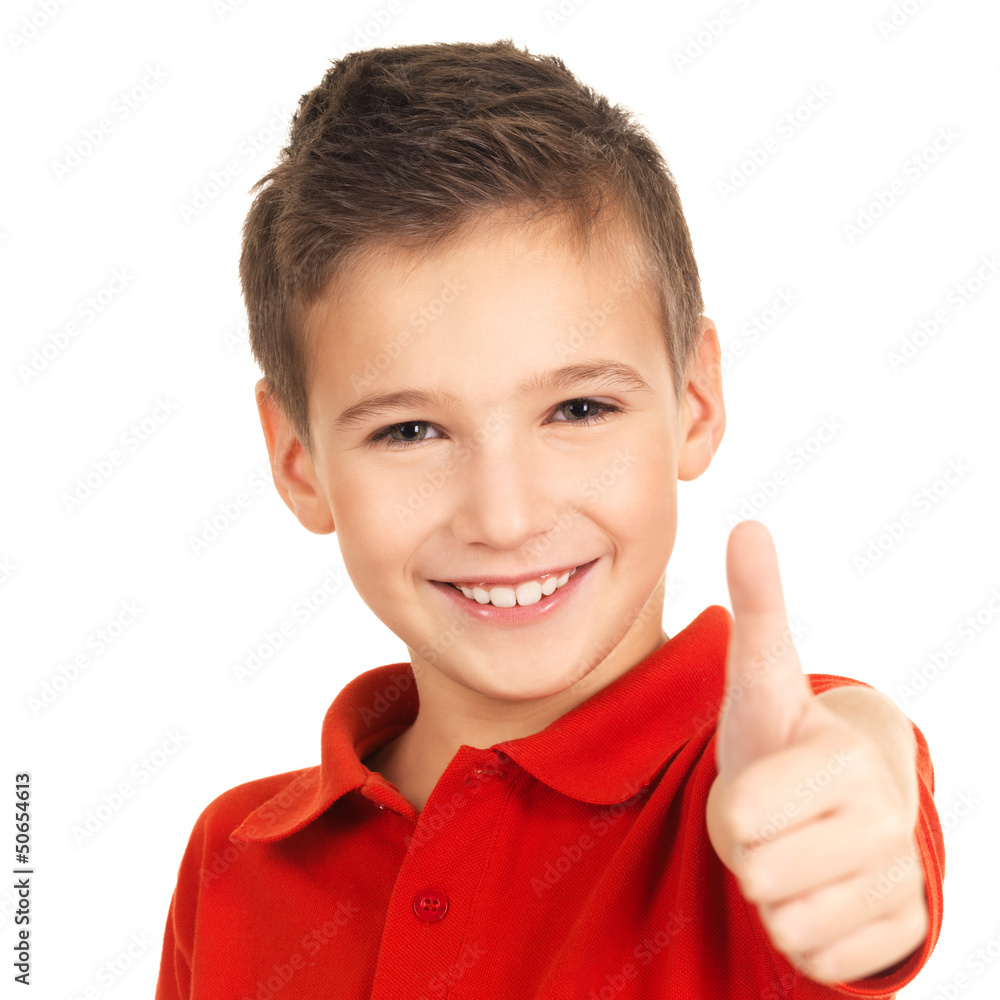 Happy boy showing thumbs up gesture Stock Photo | Adobe Stock
