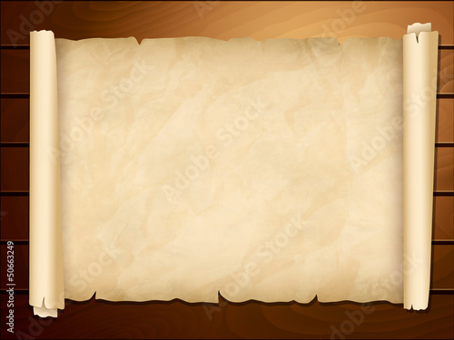 Old papyrus in the wooden background