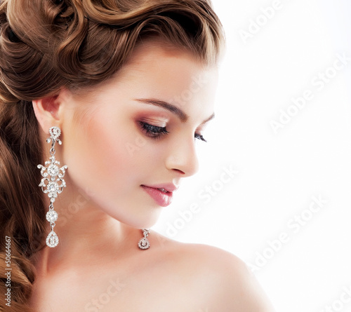 Aristocratic Lady with Diamond Earrings. Femininity
