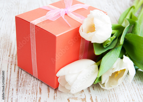 bouquet of tulips, gift box on a table