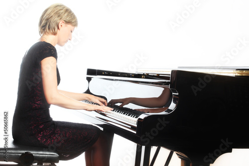 Piano playing pianist player with grand piano