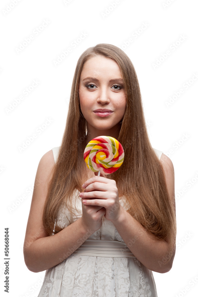 girl holding lollipop