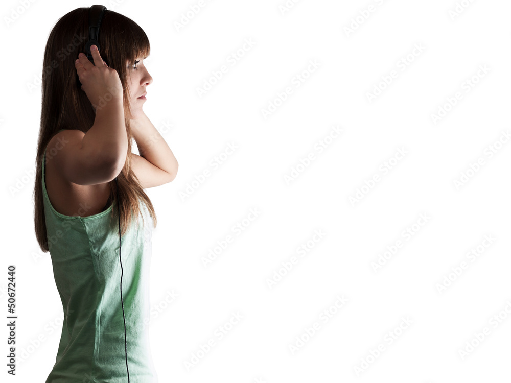 pretty young woman with headset free space right - isolated pretty young woman with headset free space right - isolated