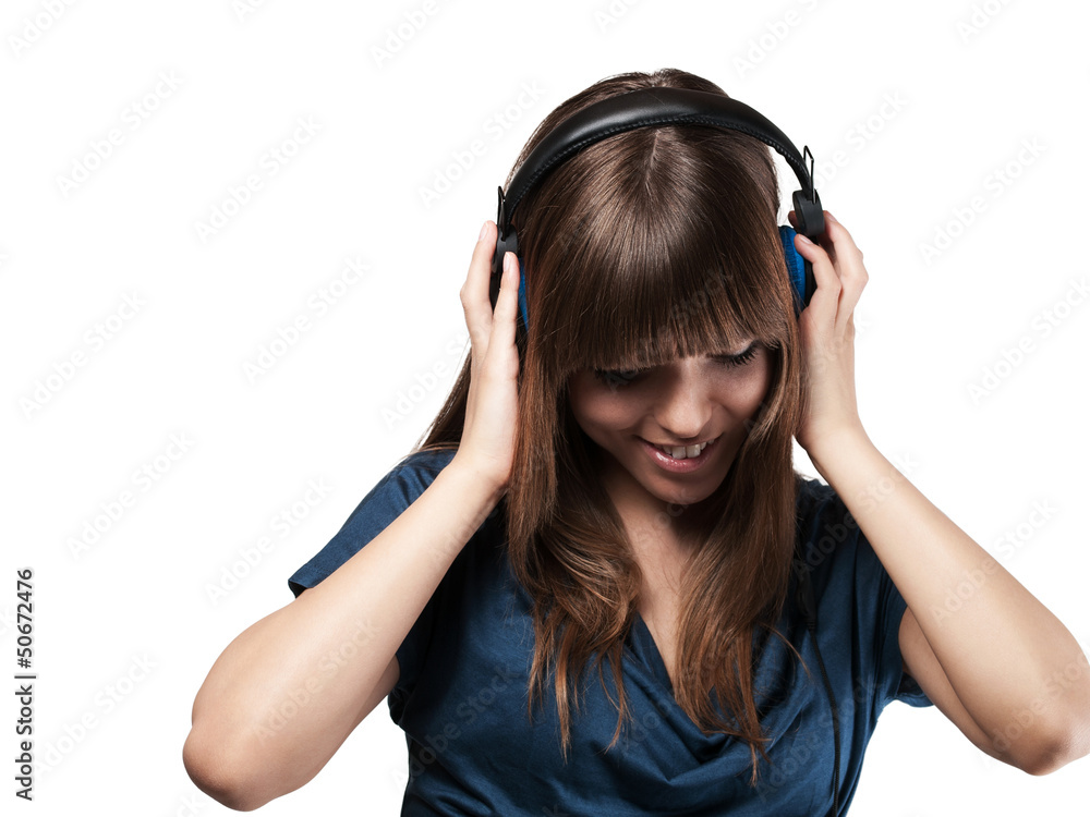 young woman is happy with her music - isolated young woman is happy with her music - isolated