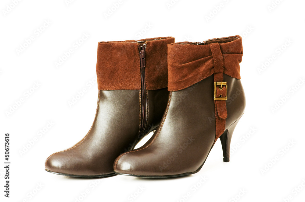 Brown boots isolated on the white background Brown boots isolated on the white background