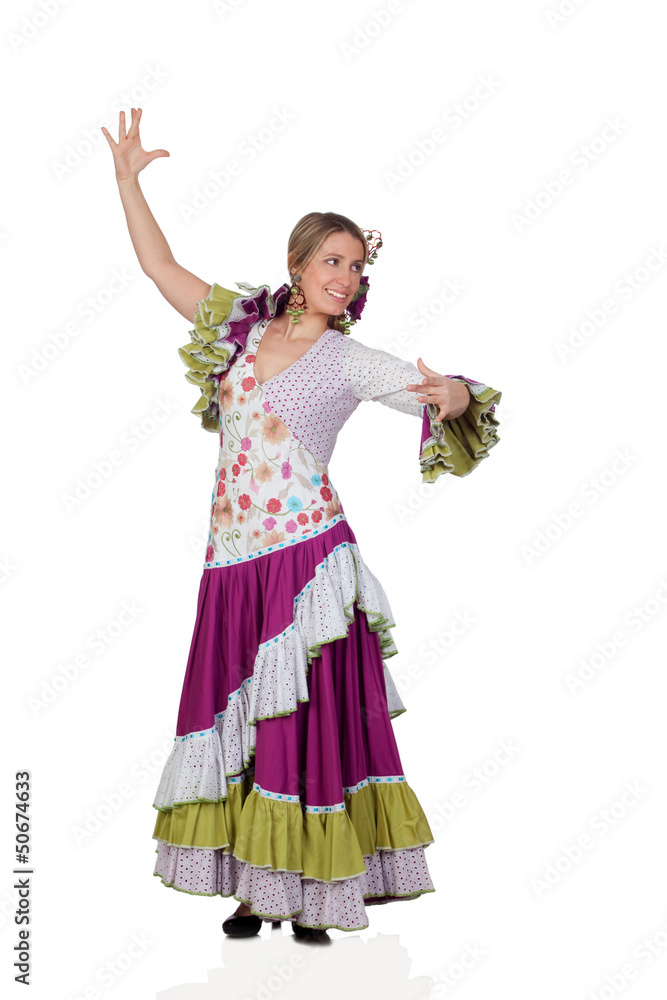 Spanish girl dressed in traditional costume Andalusian dancing Spanish girl dressed in traditional costume Andalusian dancing