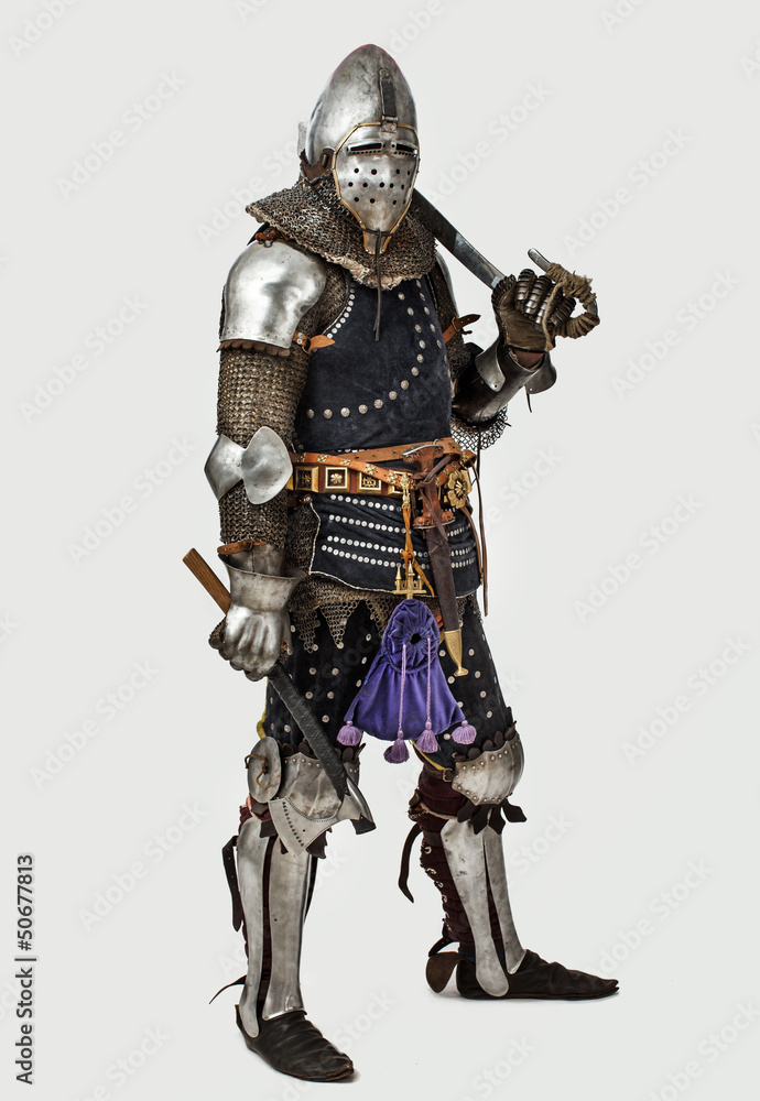 Portrait of proud knight with weapon