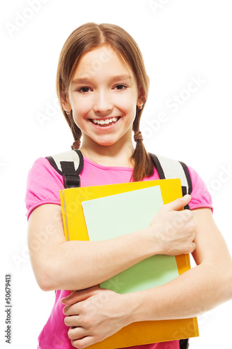 Happy smiling schoolgirl with books
