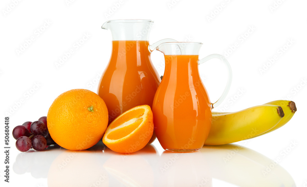 Orange juice in pitchers isolated on white Orange juice in pitchers isolated on white