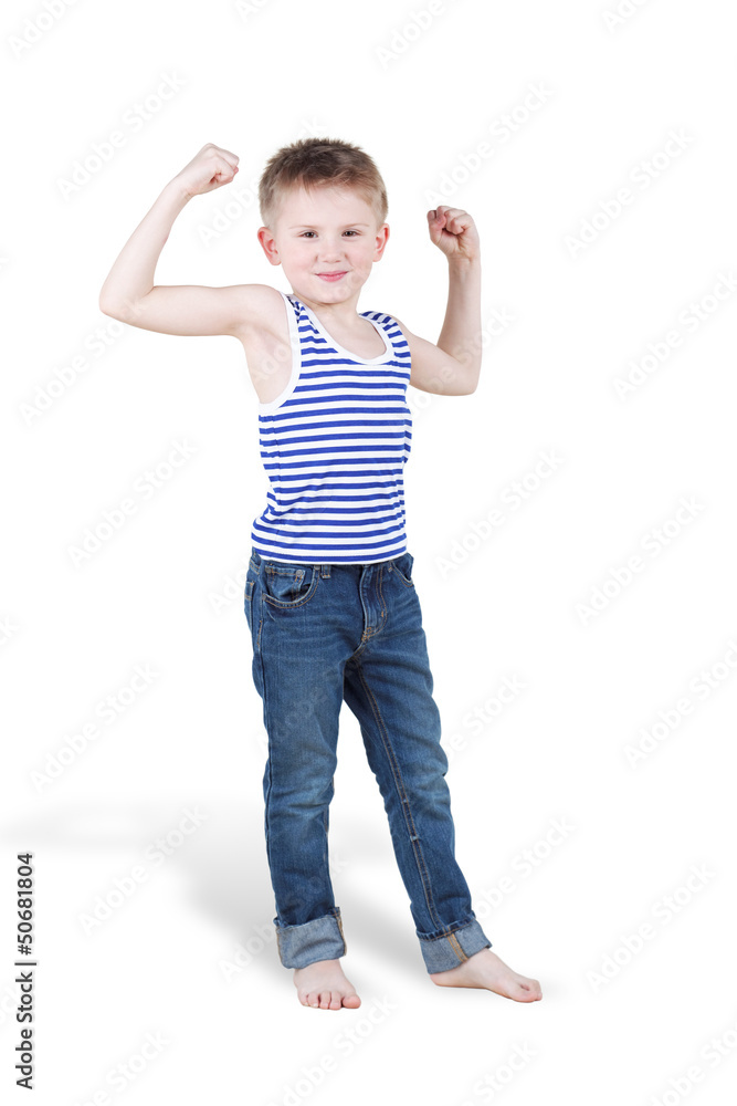 Smiling boy strains biceps and shows how strong he is Smiling boy strains biceps and shows how strong he is