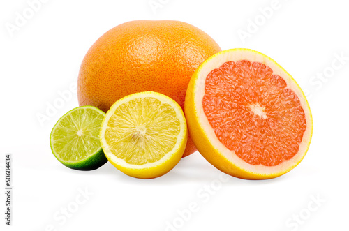 image of a fresh whole lime lemon and orange isolated on white